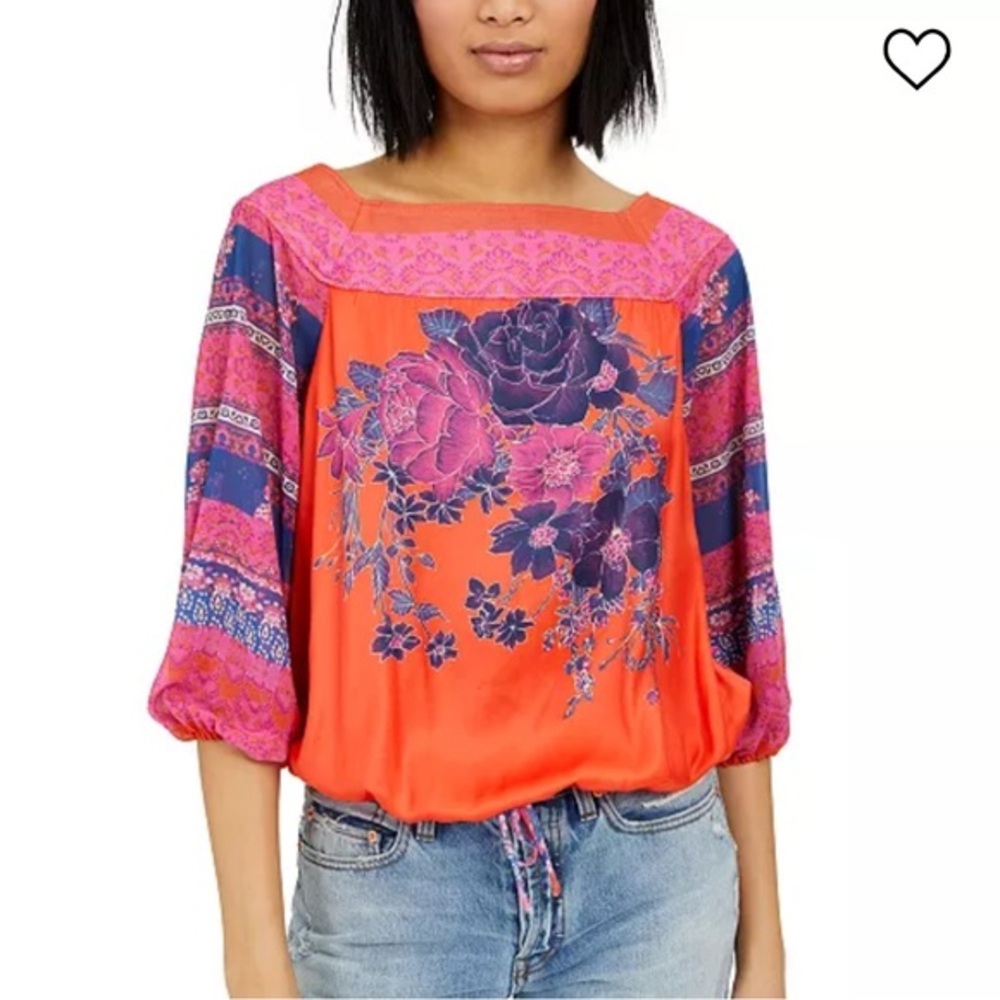 Free People
Blue Nile Printed Top NWOT size XS.